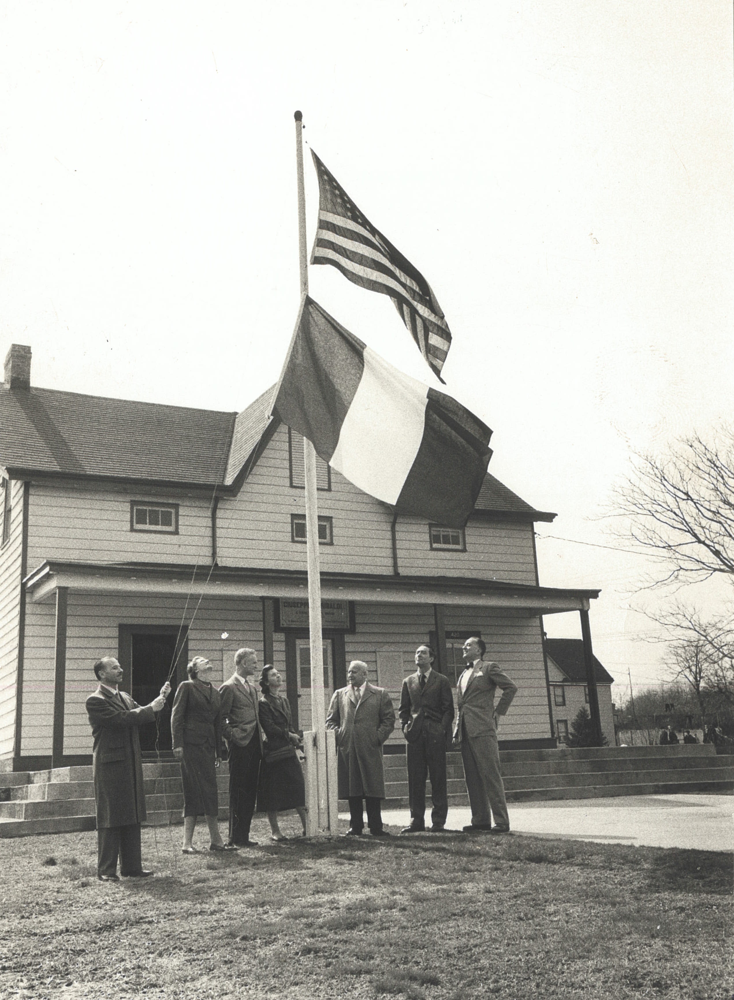 Flag-hoisting ceremony in front of the Garibaldi-Meucci Museum (1956)